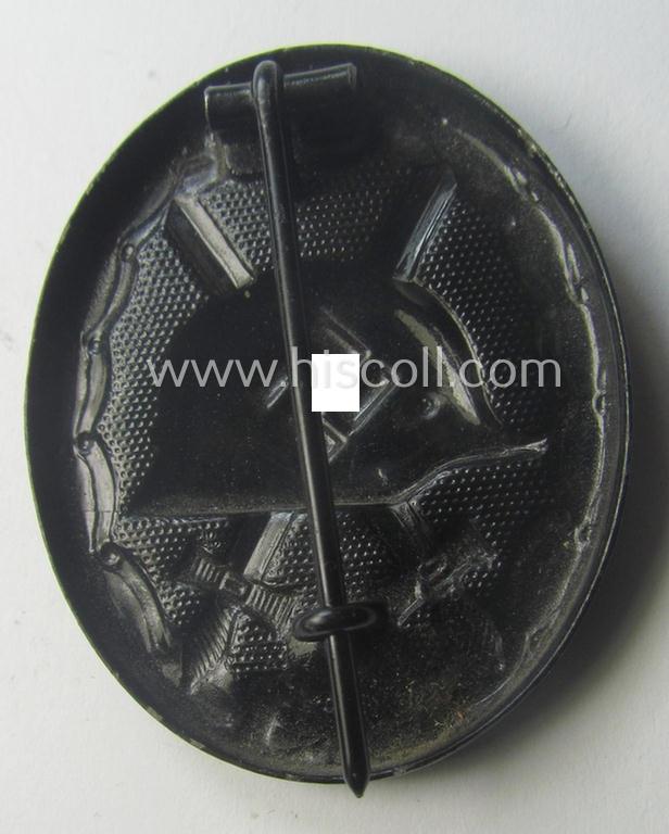 Maker- (ie. '113'-) marked example of a black-class wound-badge (or: 'Verwundeten-Abzeichen in Schwarz') being a scarcely found example that was produced by the maker (ie. 'Hersteller') named: 'Hermann Aurich'