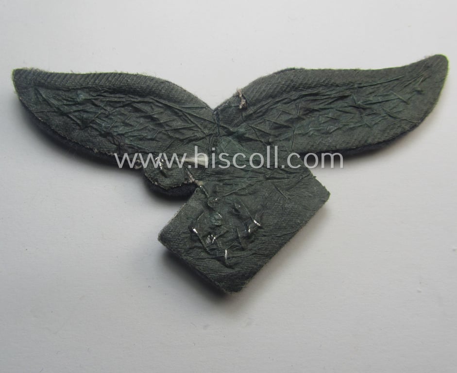 'Virtually mint' WH (Luftwaffe) officers'-pattern breast-eagle (ie. 'Brustadler für Offiziere der Luftwaffe') being a neatly hand-embroidered example of the: 'Extra Qualität' that comes in a never used- nor tunic-attached, condition