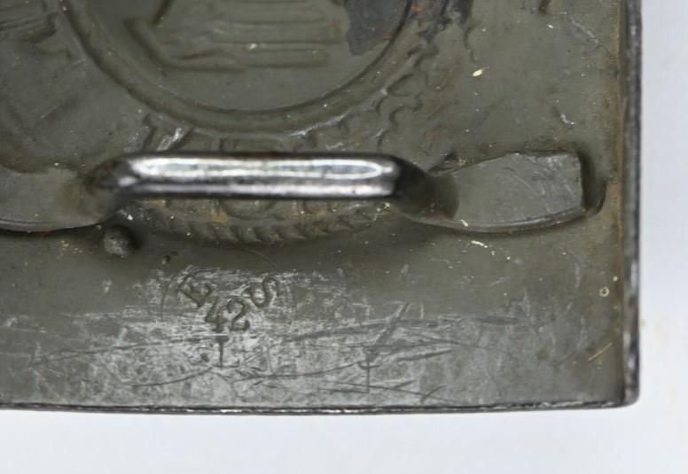 German WH Beltbuckle with Schrapnel damage and Tab 'E.Schneider'
