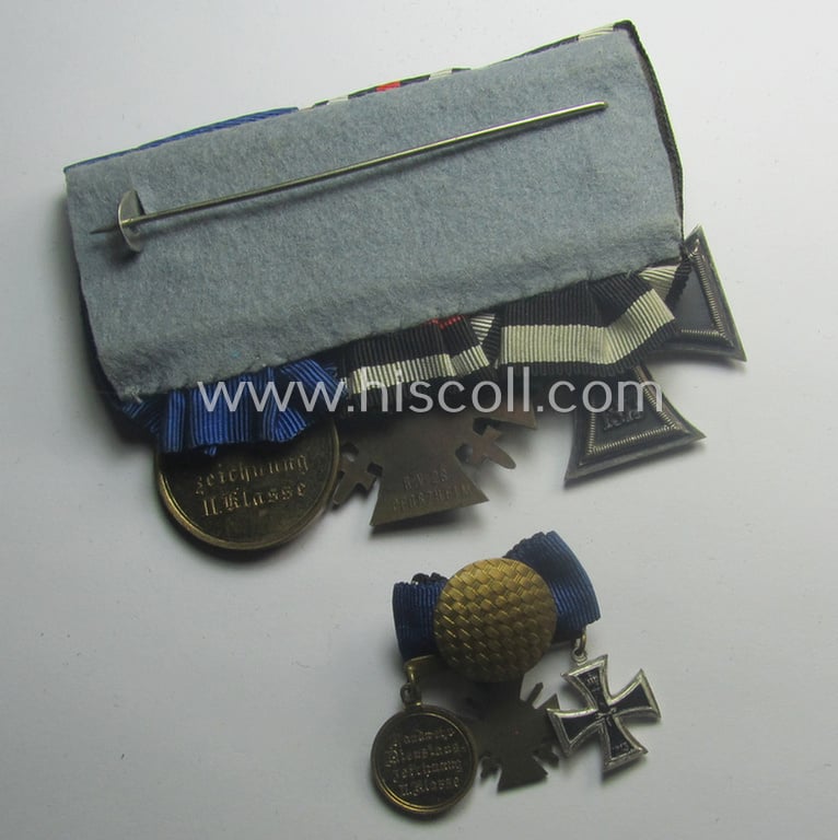 3-pieced, 'WWI'-period medal-bar (ie. 'Ordenspange') resp. depicting an: 'EK II.Kl.', a: 'FKK 1914-18 mit Schwn.' and a: 'Landwehr DA 2. Kl. 1913' that comes with its accompanying miniature 'Feldspange'