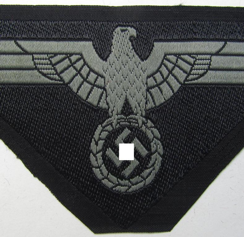 Later-war-period, WH (Heeres) ie. 'Panzer'-related-, so-called: 'M44'-pattern, trapezoid-shaped breasteagle, being a bluish-grey-coloured example as executed in neat 'BeVo'-weave pattern on a black-coloured background
