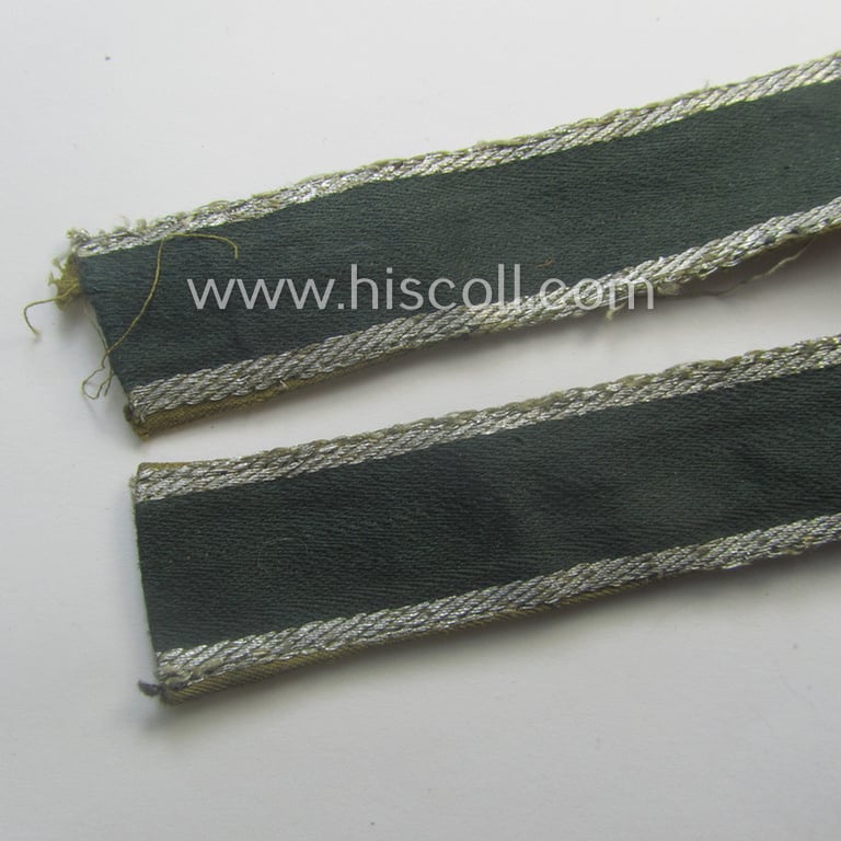 Truly worn, 'BeVo'-like cuff-title (ie. 'Ärmelstreifen') entitled: 'Afrikakorps' being a with certainty issued example that comes in an overall very nice- (ie. non-shortened- and/or once tunic-attached-), condition