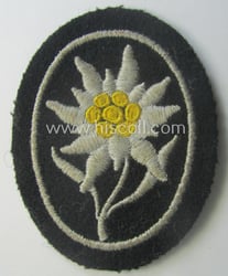 Waffen-SS-pattern, black-coloured sleeve-insignia (ie. 'Ärmelabzeichen') depicting an: 'Edelweiss'-flower...
