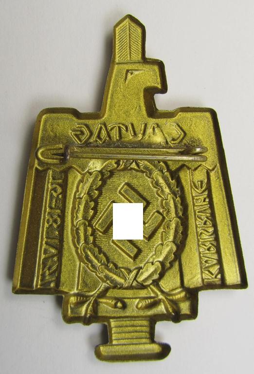 Commemorative, tin-based- and/or: bright golden-toned (I deem) N.S.D.A.P.-related 'tinnie' depicting an eagle-device resting on an upward-positioned sword and that is entitled: 'Gautag - Karlsruhe - 16.18. IV 1937'