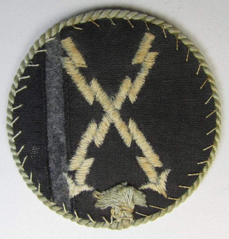 Attractive - albeit clearly used! - example of a WH (Luftwaffe) machine-embroidered, trade- ie. special-career-patch (ie. 'Tätigkeitsabzeichen') having a silverish-grey-toned 'Kordel' attached as was intended for: 'LW-Fernschreib-Unteroffiziere...