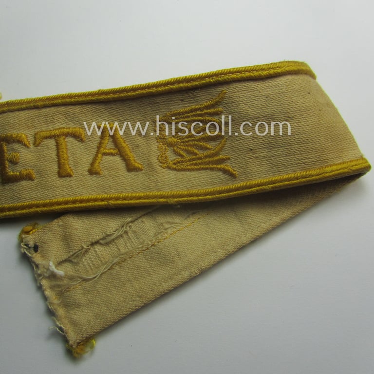 Truly worn WH cuff-title (ie. 'Ärmelstreifen') entitled: 'Kreta' (being an example that bears a printed 'RbN.'-numeral!) and that comes in a surely issued and/or carefully tunic-removed, condition