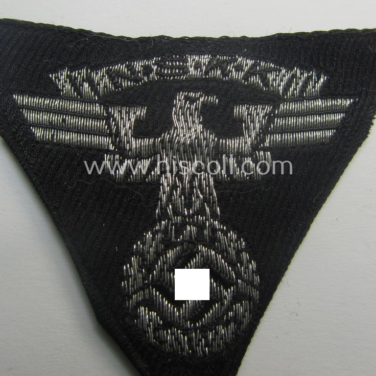 N.S.K.K. (ie. 'National Socialistisches Kraftfahr Korps') side-cap-eagle (ie. 'Adler für N.S.K.K.-Schiffchen o. Lagermütze') being a 'BeVo-woven'-example onto a black-coloured background
