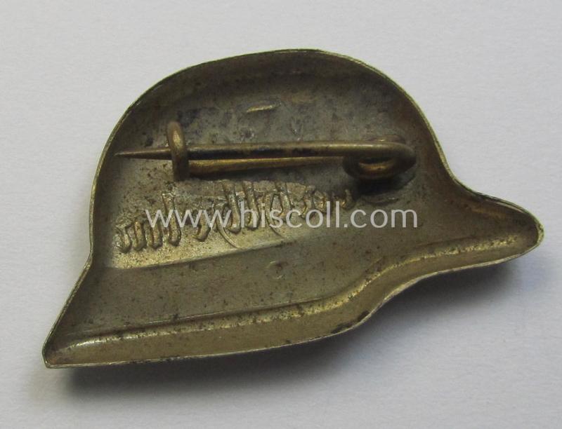 Attractive lapel-pin (ie. 'Zivilabzeichen') denoting membership within: 'Der Stahlhelm' - Bund der Frontsoldaten (Sta)' being a non-maker-marked example that is executed in silvered metal (ie. 'Buntmetall')