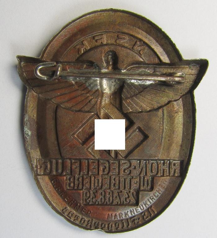 Copper-bronze-toned, N.S.F.K.-related day-badge (ie. 'tinnie') being a non-maker-marked example as was issued to commemorate a specific meeting ie. national rally entitled: 'N.S.F.K. Rhön-Segelflug Wettbewerb 23.7.-6.8.39'