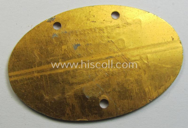 Later-war- (albeit 'standard-issue'-) pattern, WH (Kriegsmarine) typical aluminium-based- and/or bright golden-bronze toned ID-disc (ie. 'Erkennungsmarke') bearing the engraved coded numeral (ie. text) that simply reads: 'Kriegsmarine 89492/44K...