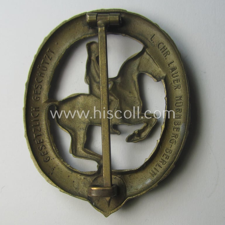 'Deutsches Reiterabzeichen der 3. Klasse (ie. 'in Bronze') being a maker- (ie. 'L.Chr. Lauer'-) marked example