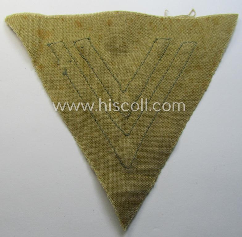 WH (Luftwaffe) tropical-styled, 'Armwinkel' (or: arm-chevron) as executed on typical beige- ie. tan-coloured linnen as was specifically intended for usage by a soldier with the rank of an: 'Obergefreiter'