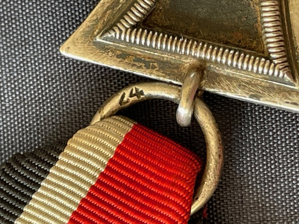 WWII GERMAN IRON CROSS 2ND CLASS NUMBERED RING 24 FOR ARBEITSGEMINSCHAFT FUR HEERESHEDARF IN DER GRAVEUR UBD ZISELIERUNG