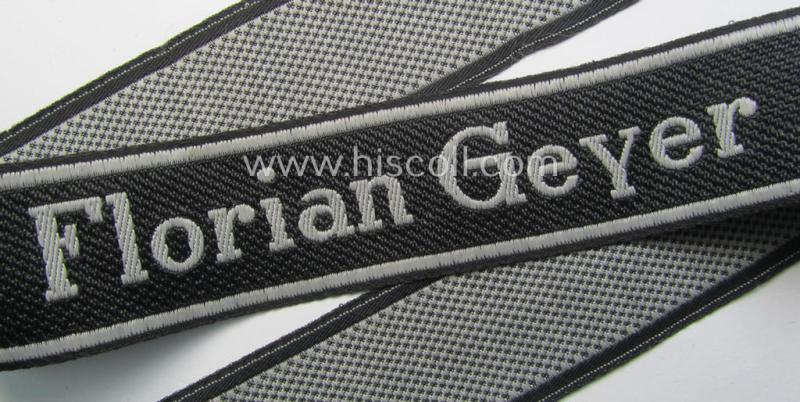 Waffen-SS, 1943-pattern cuff-title (ie. 'Ärmelstreifen') depicting the ('BeVo') machine-woven, Latin script text in silverish-grey linnen as was intended for a member of the: '8. SS-Kavallerie-Division “Florian Geyer”
