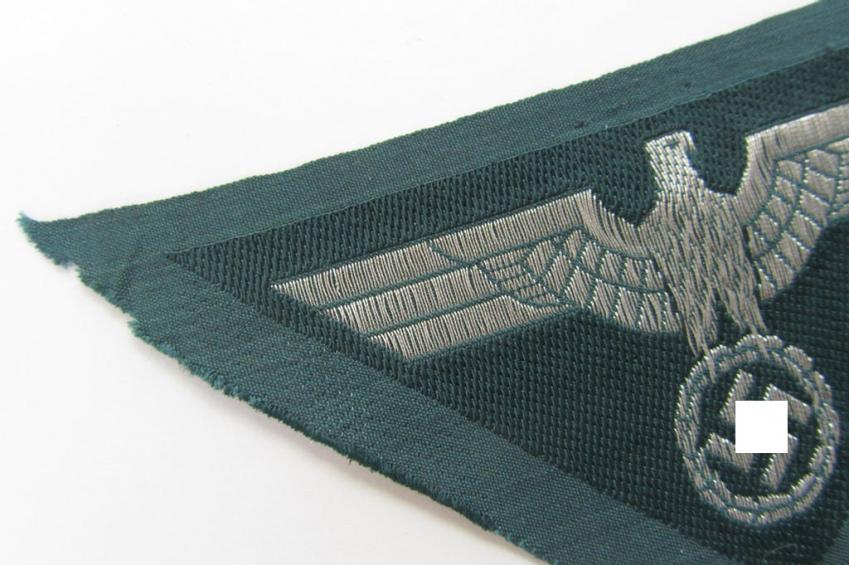 Attractive - and rarely encountered! - later-war-period-, WH (Heeres) ie. 'officers'-type-, so-called: 'M44'-pattern-, trapezoid-shaped breasteagle, being a silver-coloured example as executed in neat 'BeVo'-weave, flat-wire-pattern