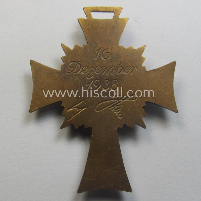 'Ehrenkreuz der deutschen Mutter - dritte Stufe' (or: bronze-class mothers'-cross) that came together with its long-sized (and mint!) ribbon and that came stored in its period pouch (by the maker: 'Friedrich Keller - Oberstein')