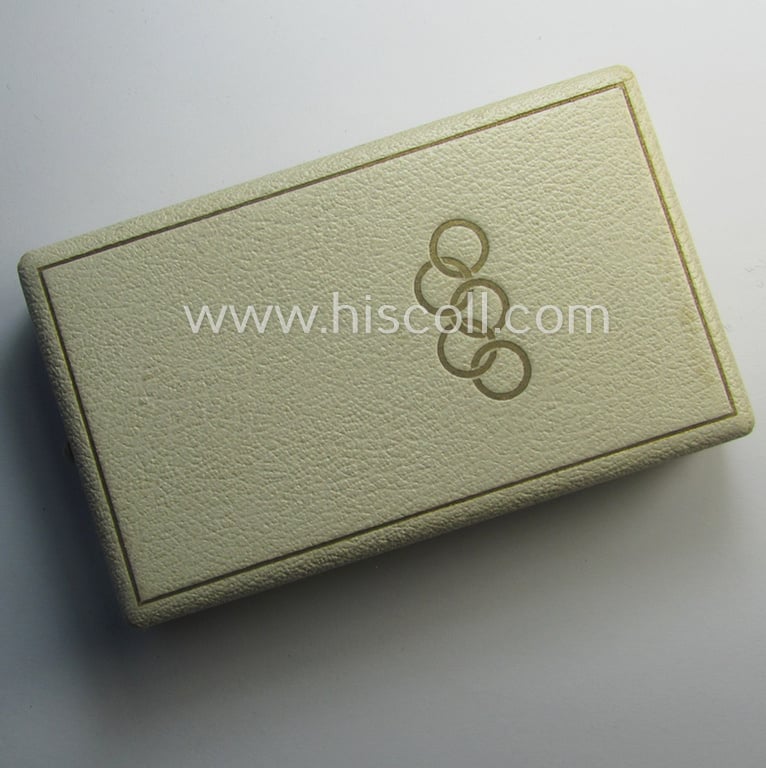 Superb, 'Deutsche Olympia-Erinnerungsmedaille 1936' being a non-maker-marked example that comes mounted onto its original ribbon (ie. 'Bandabschnitt') and that comes stored in its typical, beige-white-coloured etui