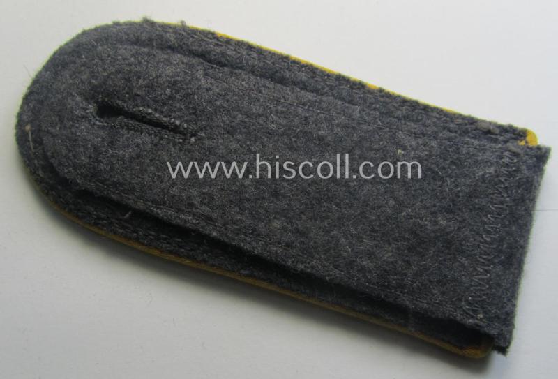 Single, mid- (ie. later-) war-period WH (Heeres) NCO-type shoulderstrap as piped in the golden-yellow- (ie. 'goldgelbener'-) coloured branchcolour as was intended for usage by an: 'Uffz. der Flieger o. Fallschirm-Trpn.'