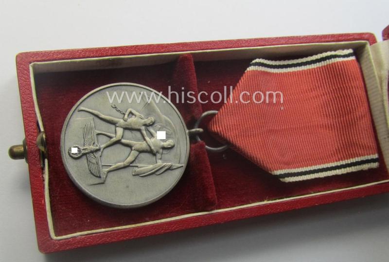 WH Austrian-occupation- (ie. 'Anschluss'-) medal: '13. März 1938' being a very attractive (and hardly tarnished) example that comes stored in its bright-red-coloured- and/or typical non-maker-marked etui as issued