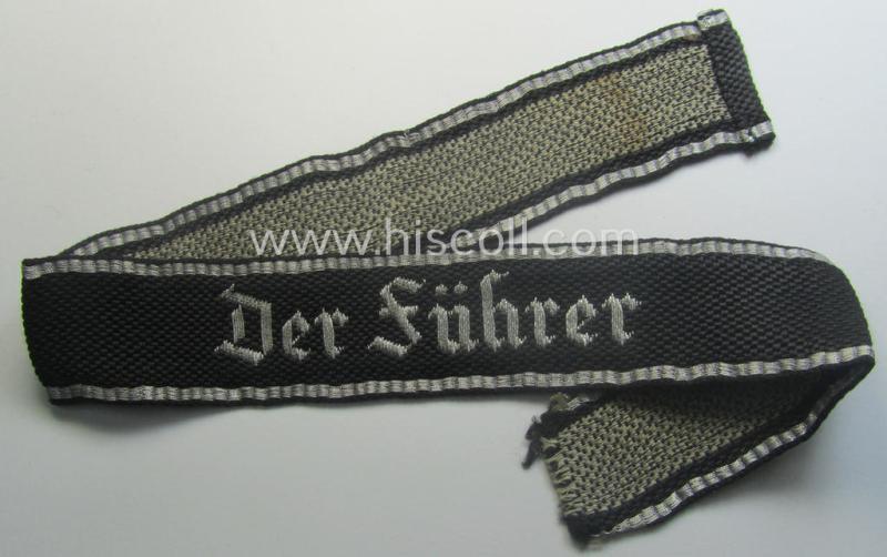 Truly used- and/or carefully tunic-removed example of a: Waffen-SS 1939/40-pattern, officers'-type 'flat-wire'-woven cuff-title (ie. 'Ärmelstreifen für Führer'): Regiment 'Der Führer' (2. SS-Pz-Div. "Das Reich")
