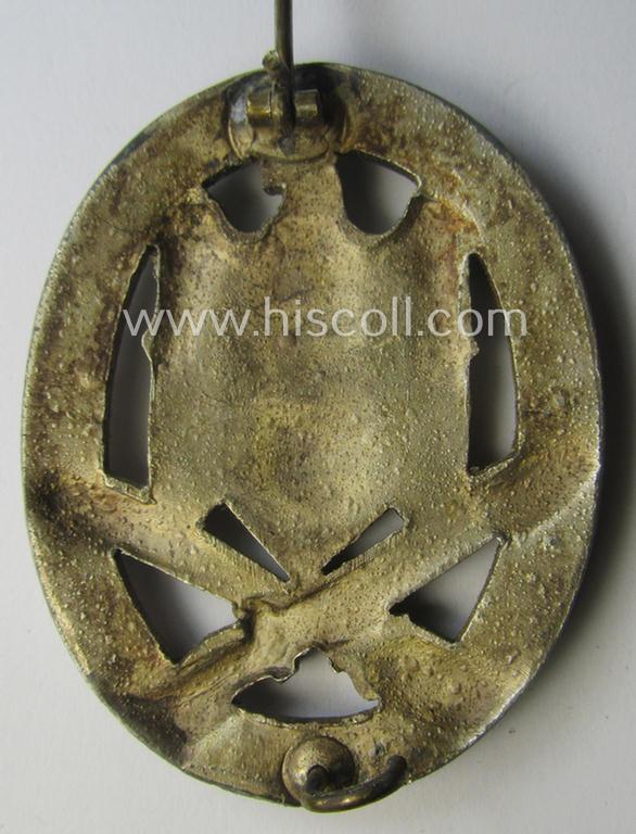 'Allgemeines Sturmabzeichen' (or: General Assault Badge ie. GAB) being a typical unmarked, zinc-based- (ie. 'Feinzink'-) and/or: 'semi-hollow-back'-version as was (I deem) produced by the: 'Rudolf Karneth'-company