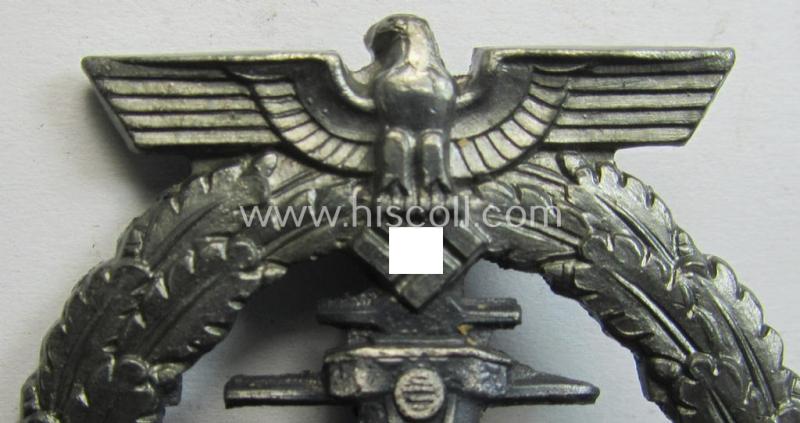 WH (KM) 'Flottenkriegsabzeichen' (or: high-sea fleet badge) being a typical zinc- (ie. 'Feinzink'-) based and/or (I deem) later-war-period version that is neatly maker- (ie. 'Fec. Adolf Bock' ) marked on its back