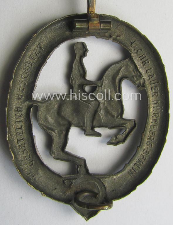 'Deutsches Reiterabzeichen der 3. Klasse (ie. 'in Bronze') being a maker- (ie. 'L.Chr. Lauer'-) marked example