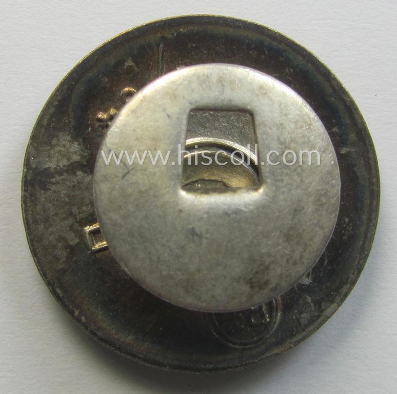 'N.S.D.A.P.'-membership-pin- ie. party-badge (or: 'Parteiabzeichen') which is maker-marked on its back with the makers'-designation: 'RzM' and/or: 'M1/34'