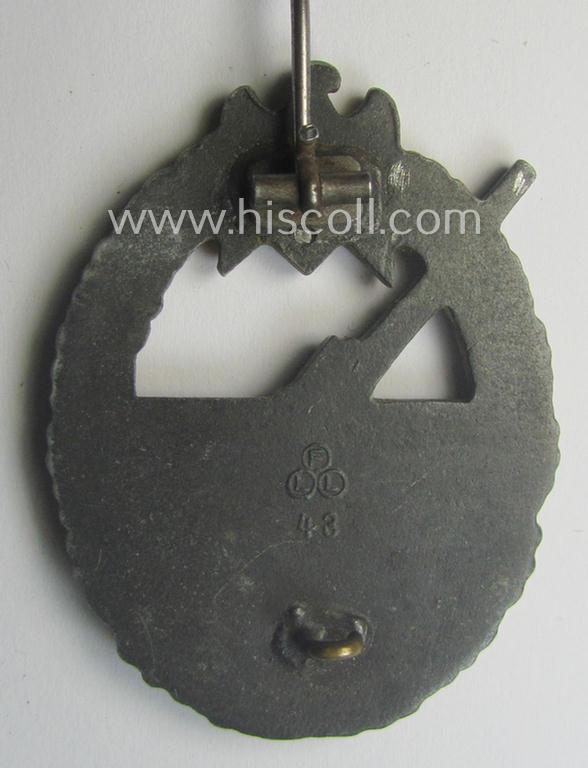 WH (KM) 'Marine-Artillerie-Abzeichen' being a maker- (ie. 'F.L.L. - 43'-) marked- and/or zinc- (ie. 'Feinzink'-) based example by the: 'Friedrich Linden'-company