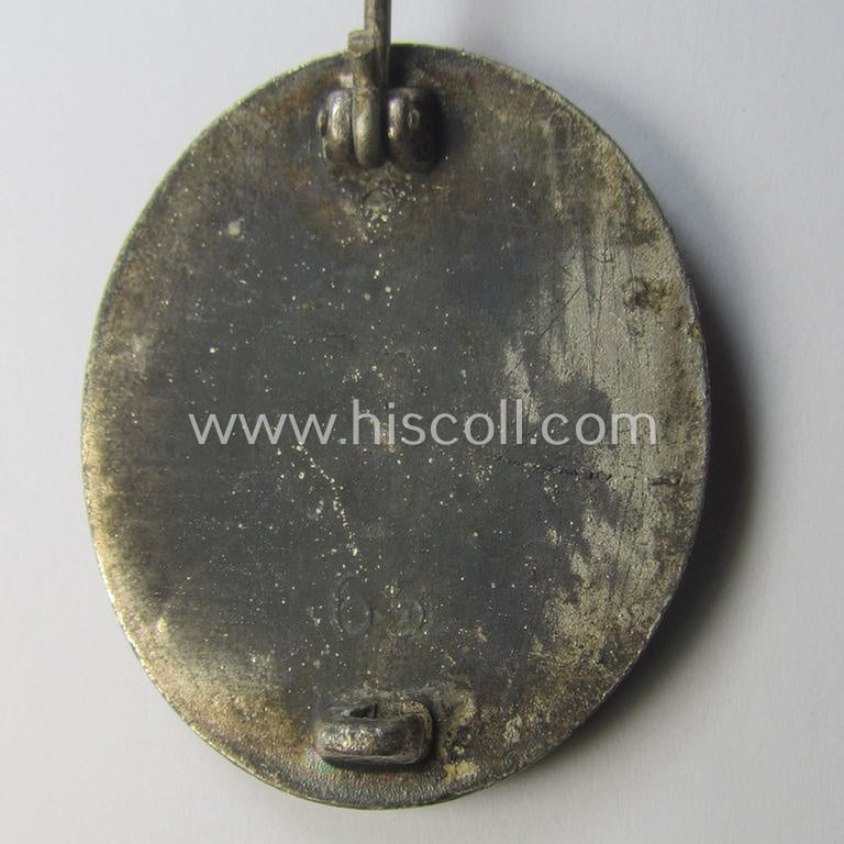 Silver-class wound-badge (or: 'Verwundeten-Abzeichen in Silber') being a maker- (ie. '65'-) marked example as was produced by the 'Hersteller' ie. maker: 'Klein u. Quenzer'