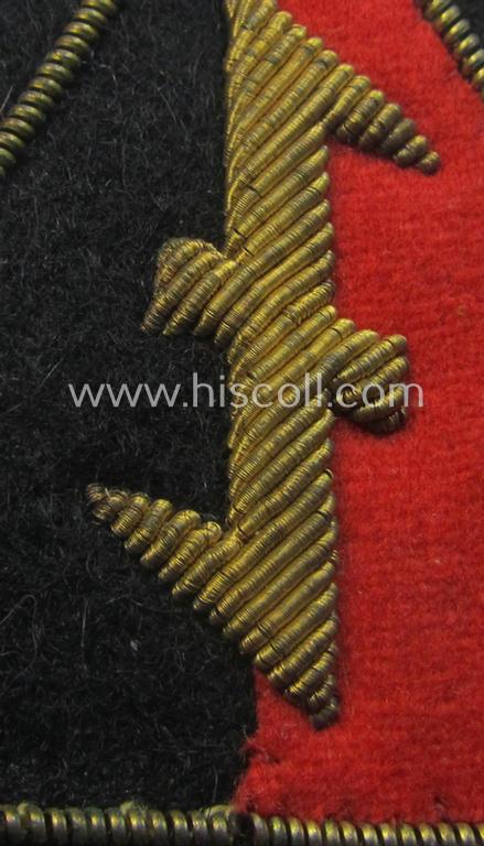 Attractive - and presumably Dutch-produced - example of an early-pattern (and truly neatly hand-embroidered!) WA- (or: 'Weerafdelingen'-) related 'Wolfshook'-cap-triangle as was intended for usage on the black-coloured visor-caps