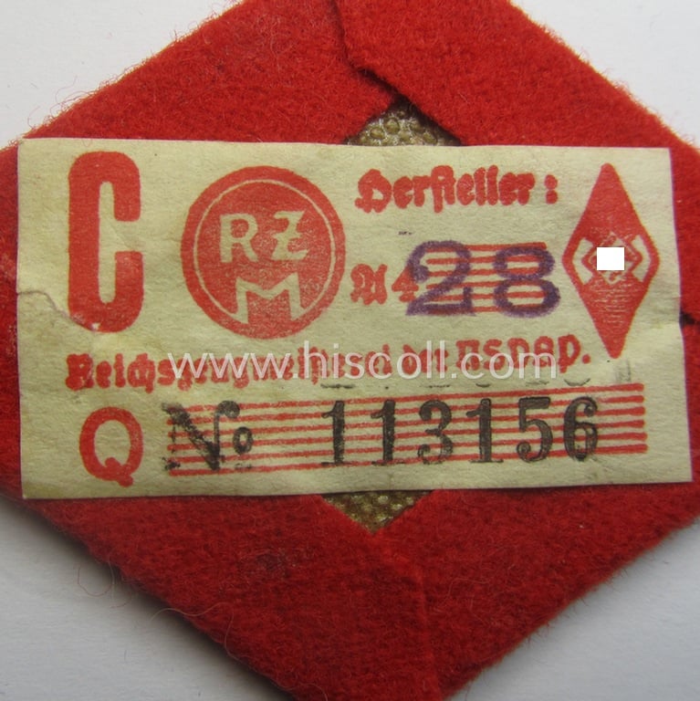 Superb - and rarely found! - neatly hand-embroidered, HJ (ie. 'Hitlerjugend') arm-badge as was specifically intended for usage by an: 'HJ-Adjutant' (still retaining its 'RzM'-etiket)
