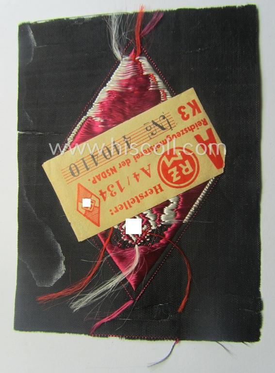 HJ ('Hitlerjugend') 'Feuerwehr Formationsabzeichen' (or: youth fire-fighter badge ie. 'Raute') as neatly executed in 'BeVo'-weave pattern and that still shows its period-attached 'RzM'-etiket