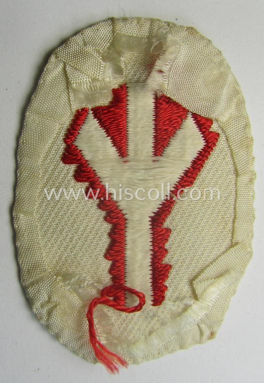 Truly used, HJ/BDM (ie. 'Hitlerjugend'/'Bund Deutscher Mädel') trade- or specialist-armbadge as executed in neat 'BeVo'-weave pattern as was intended for usage by a: 'Feldscher' (or: medical orderly)