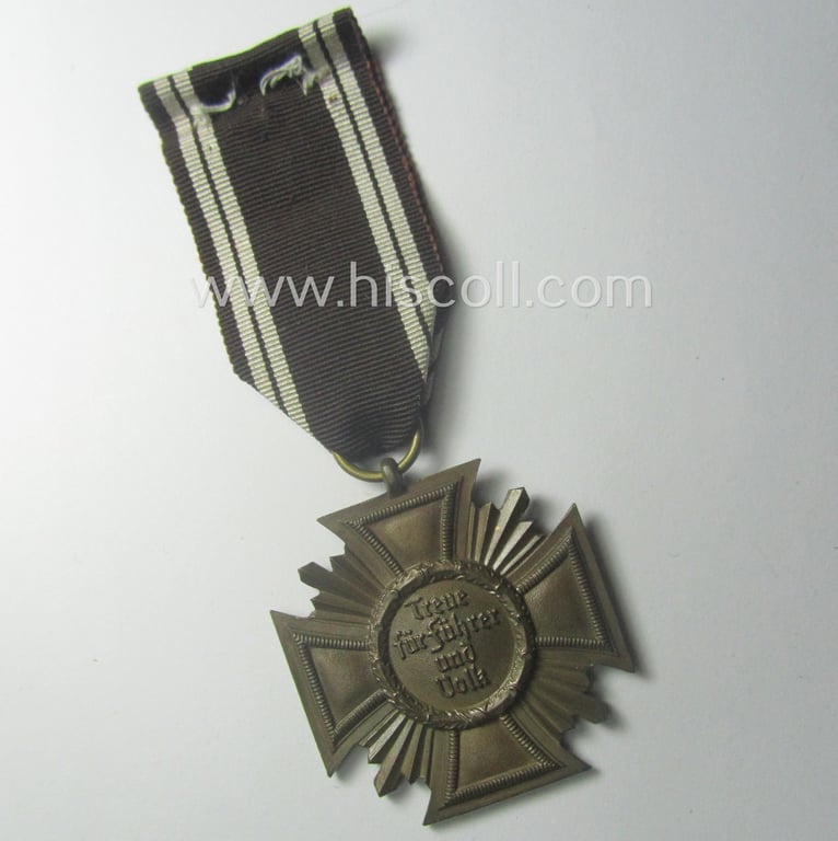 'N.S.D.A.P. Dienstauszeichnung in Bronze' (ie. '3. Stufe für 10 Jahre t. Dienste') being a non-maker- marked- (and typical 'Buntmetall'-based!) example that came mounted onto its period ribbon