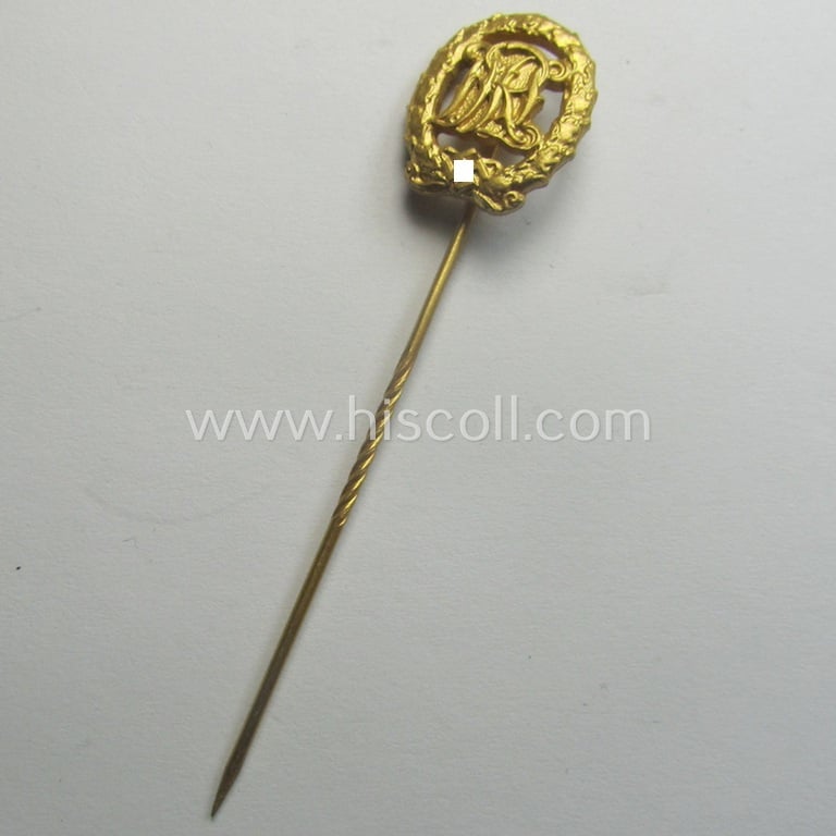 Superb, 'Reichssportabzeichen DRL in Gold' (or: golden-class DRL sports'-badge) being a maker- (ie. 'Wernstein - Jena'-) marked example and that comes with its accompanying miniature