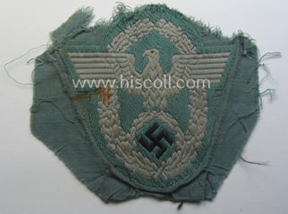 Clearly used- and/or tunic-removed, police- (ie. 'Polizei'-) related...