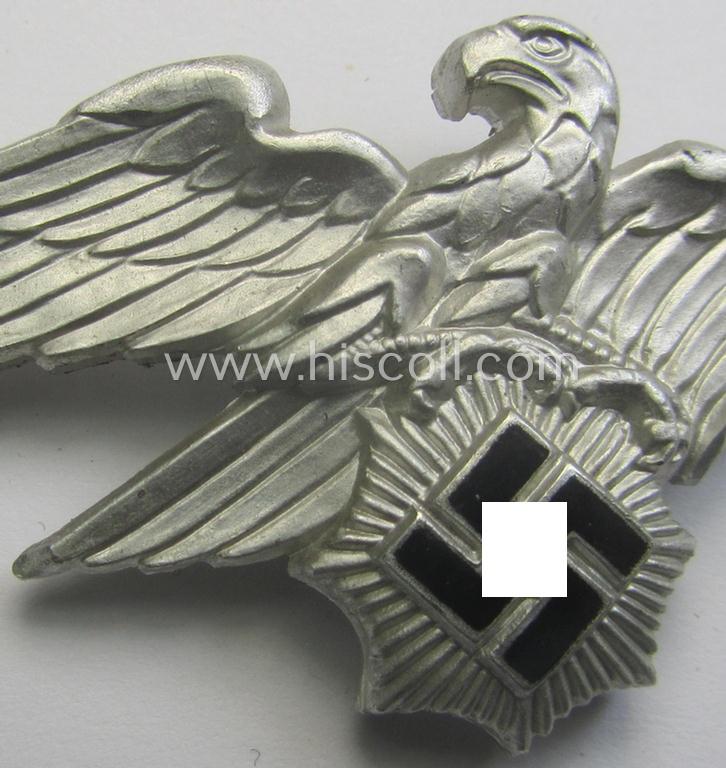 Officers'- (ie. evt. NCO-) pattern, aluminium-based so-called: 'Luftschutz' (ie. RLB-) visor-cap eagle being a maker- (ie. 'HA'-) marked example as was produced by the 'H. Aurich'-company