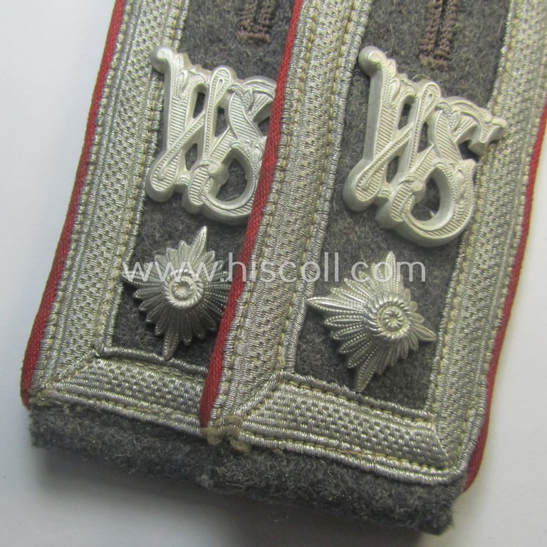 Fully matching - and rarely seen! - pair of neatly 'cyphered', WH (Luftwaffe) NCO-type shoulderstraps as piped in the bright-red-coloured branchcolour as was intended for a: 'Wachtmeister einer Luftwaffen-Waffenschule'