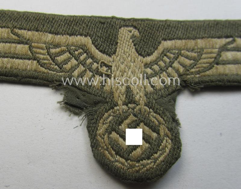 Clearly tunic-removed, WH (Heeres) very-early- (ie. pre)-war-period- and/or greyish-coloured breast-eagle (ie. 'Brustadler für Mannschaften u. Uffz.')
