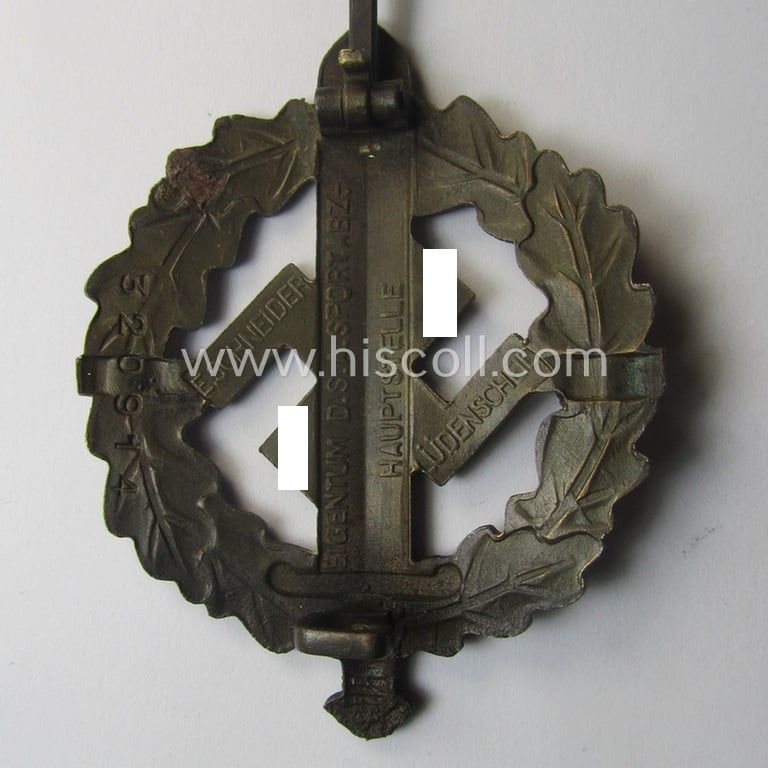 Early- (ie. pre-) war-period 'SA Sportabzeichen in Bronze' being a nicely maker- (ie. 'E. Schneider'-) marked example that bears a unique, stamped bearers'-number that reads: '320914' on its back