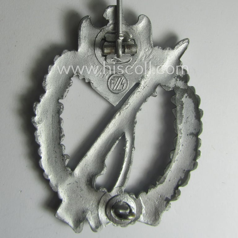 Zinc- (ie. 'Feinzink'-) based, 'Infanterie-Sturmabzeichen in Silber' being a maker- (ie. 'FZZ'-) marked example as being produced by the: 'Fritz Zimmermann'-company