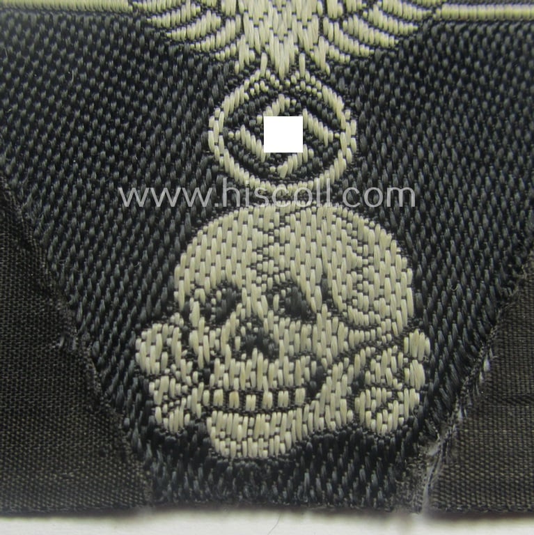 Truly used and worn, Waffen-SS black-coloured 'M43'-pattern 'Panzer'-cap-trapezoid as executed in 'BeVo'-weave-pattern as was specifically intended for usage on the 'M43'-model field-caps (ie. 'Einheitsfeldmützen')