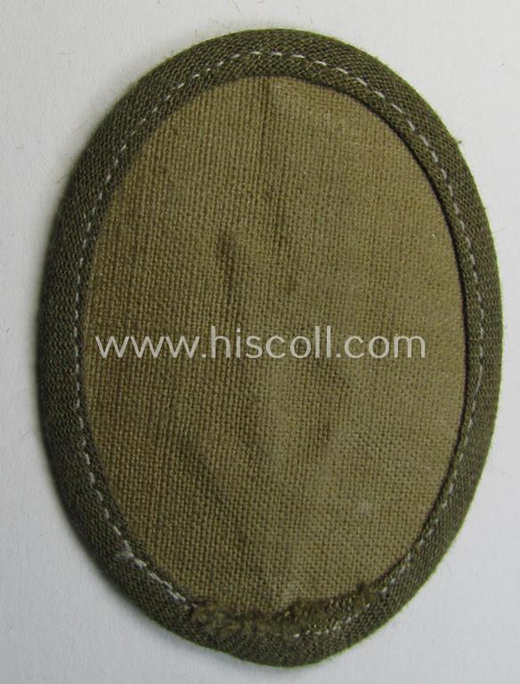 WH (Heeres) 'tropical-styled', trade- and/or special-career insignia (or: 'Signal Blitz') as was intended for a soldier who served within the: 'Artillerie-Truppen'