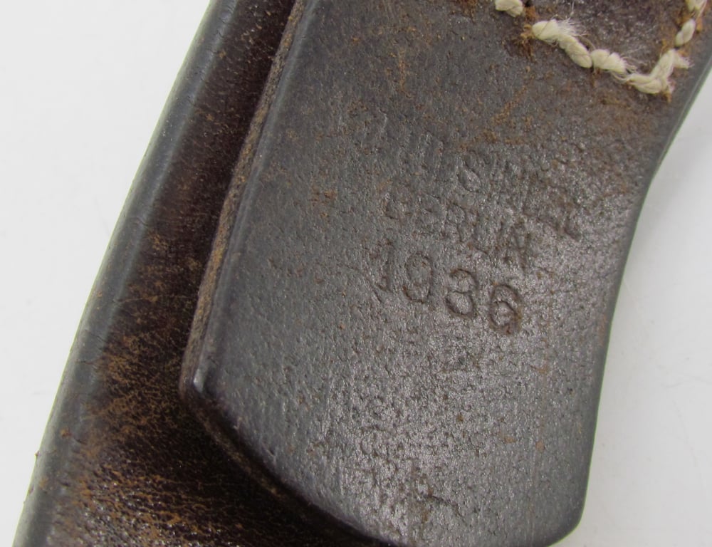 Early Wehrmacht leather equipment belt with aluminum hook (1936)