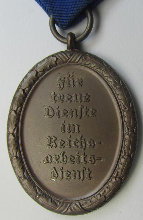 RAD (ie. 'Reichsarbeitsdienst'): 'Dienstauszeichnung 4. Stufe für Männer' as was intended for 4 years loyal-service and that comes mounted onto its period (broad-sized) ribbon (ie. 'Bandabschnitt')