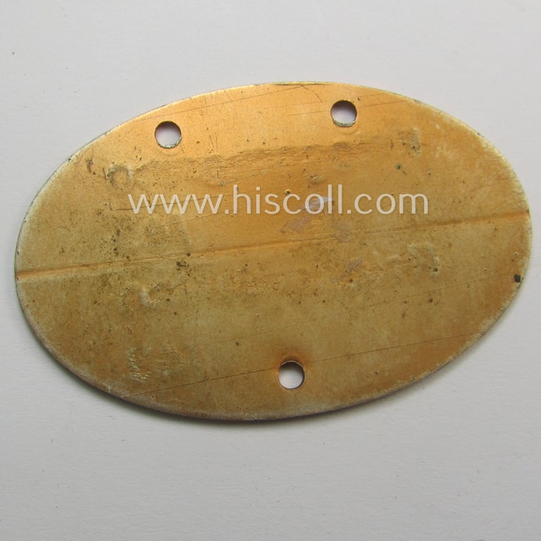 Later-war- (albeit 'standard-issue'-) pattern, WH (Kriegsmarine) typical aluminium-based- and/or bright reddish-bronze toned ID-disc (ie. 'Erkennungsmarke') bearing the engraved coded numeral (ie. text) that simply reads: 'Kriegsmarine 32576/43'
