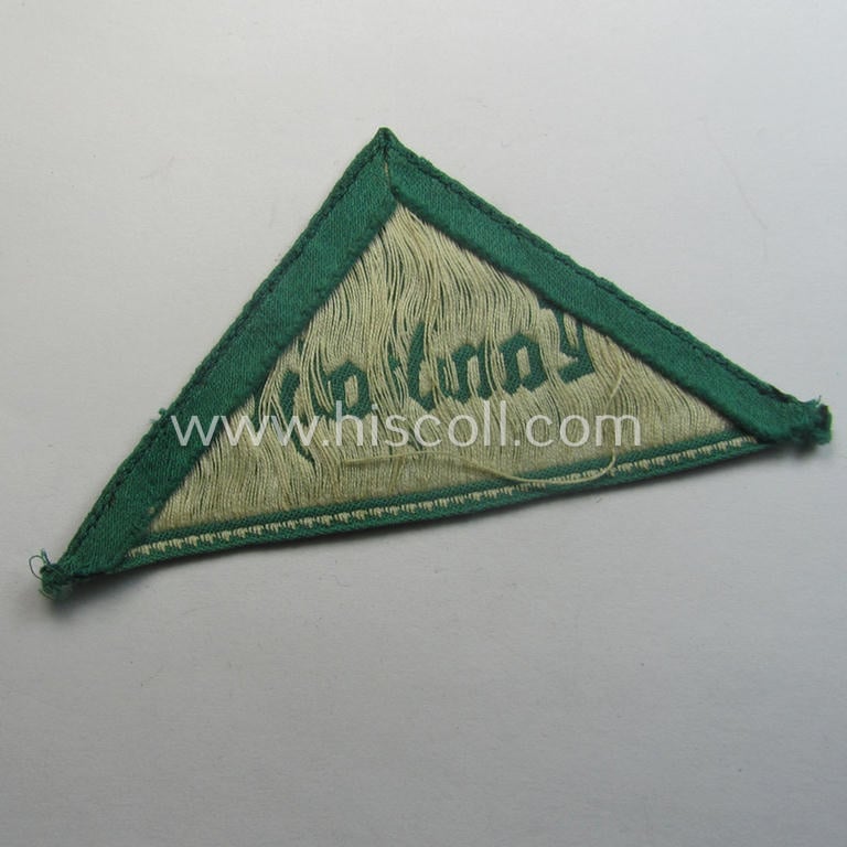 HJ (ie. 'Hitlerjugend') honorary-district-triangle (ie. 'Gebietsdreieck') entitled: 'Landjahr' being an example that still retains its 'RzM'-etiket and that comes in an overall very nice- (albeit just moderately used ie. worn-), condition