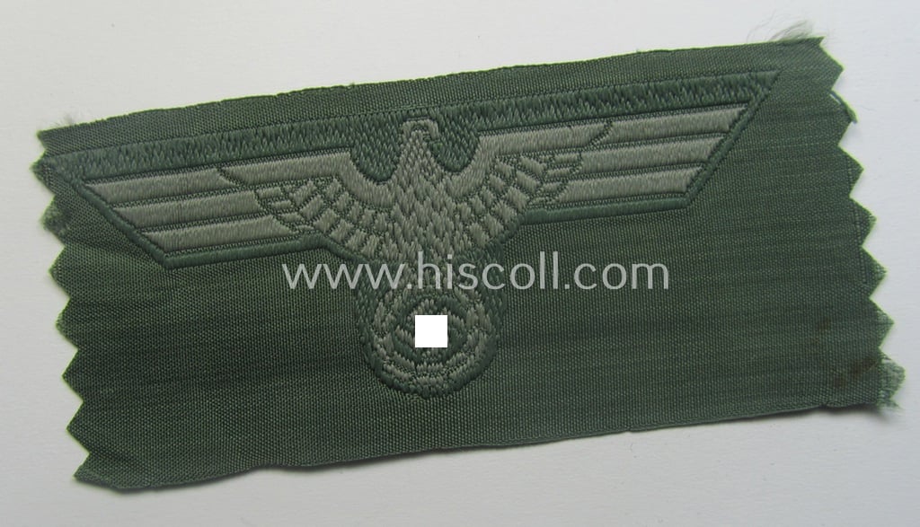 Early- (ie. mid-) war-period, WH (Heeres) cap-eagle & cocarde-set (ie. 'Schiffchenmützen-Adler u. Kokarde-Satz für Mannschaften u. Uffz.') being a 'virtually mint' set as executed in bluish-grey-coloured linnen on a field-grey-coloured background
