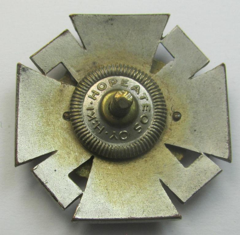 Finnish-/German: 'Nordfrontkreuz', being a white-/blue-coloured and maker- (ie. 'Hopeatakomo o.y.'-) marked 'variant' that shows the text: 'Pohjoisrintama - Die Nordfront - 1941/43'